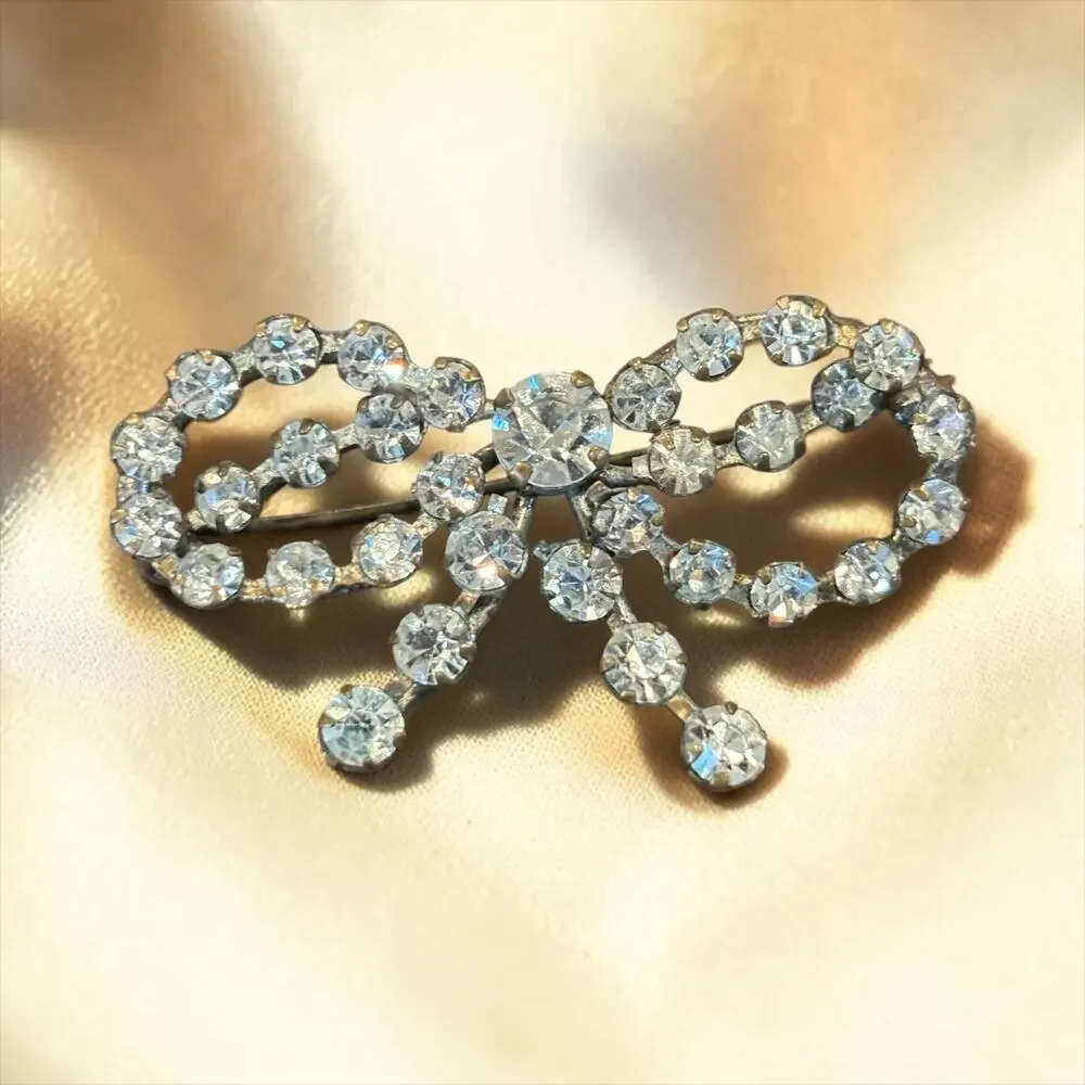 Antique Rhinestone Bow Brooch Art Deco Sparkle Paste Glass Ribbon Pin